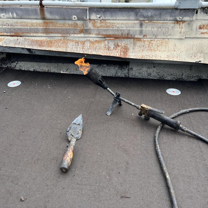 tools on a commercial roof